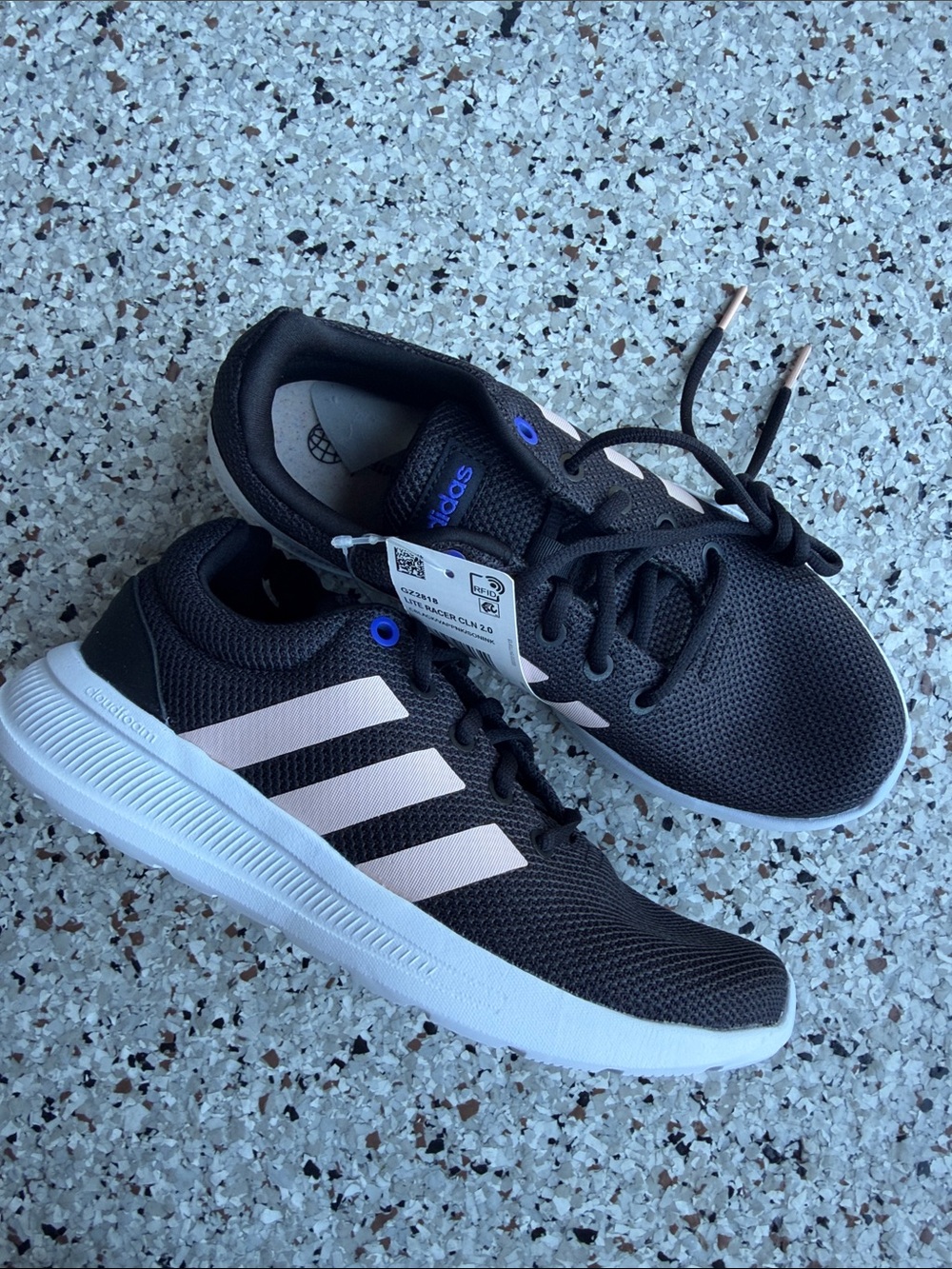 adidas women’s Black Sneakers with Light Pink Stripes